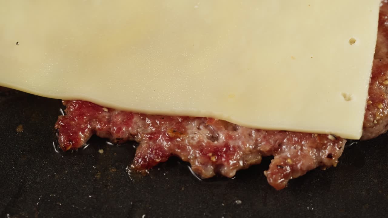 Cooking a Hamburger with Cheese