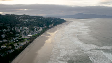 aerial view of a scenic coastal town and beach