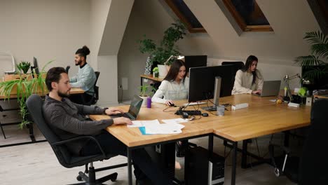 group of colleagues working in modern office