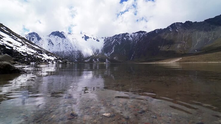 Slight zoom out view of the sun lagoon in nevado de toluca volcano also called xinantecatl which is rarely this snowy