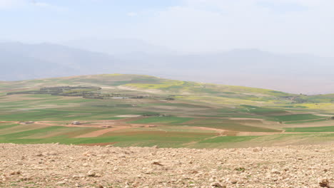 green rolling hills of moroccan pre-atlas landscape, right pan