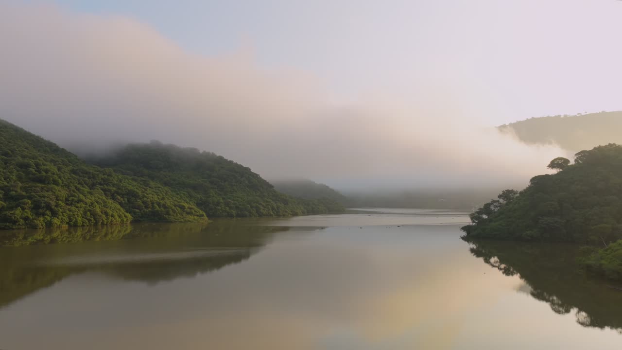 Misty Morning Over Calm Lake At El Carrizo Reservoir In Jalisco, Mexico. panning shot