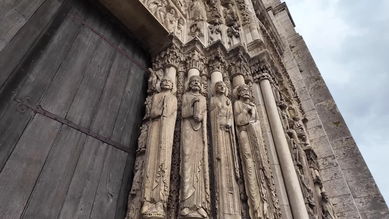 Carvings in stone walls of the Cathedral Our Lady of Chartres in France