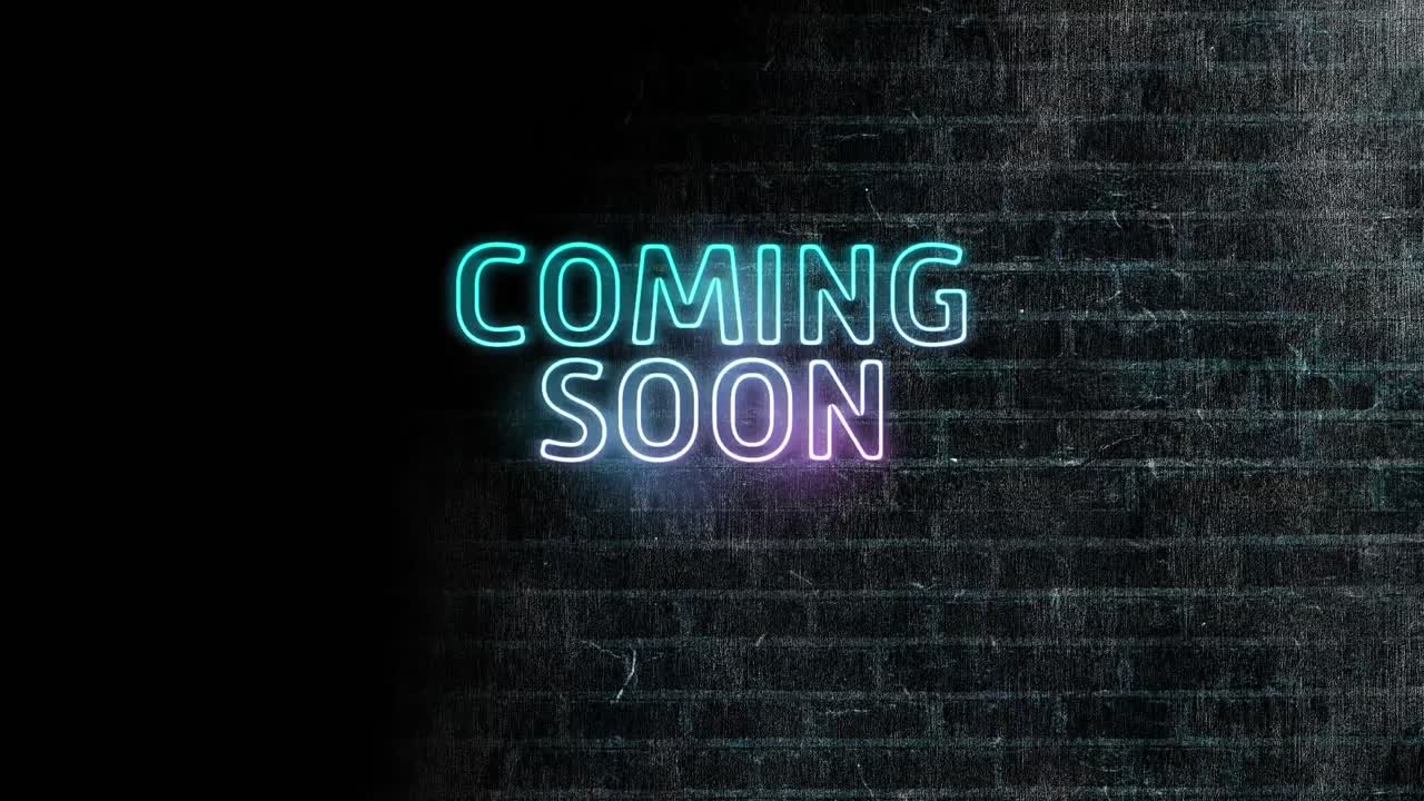 Animation of neon coming soon text over black brick wall
