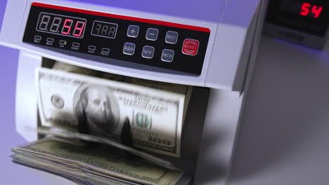 dollar counting equipment in bank. money banking counter. money and economics concept. cropped view