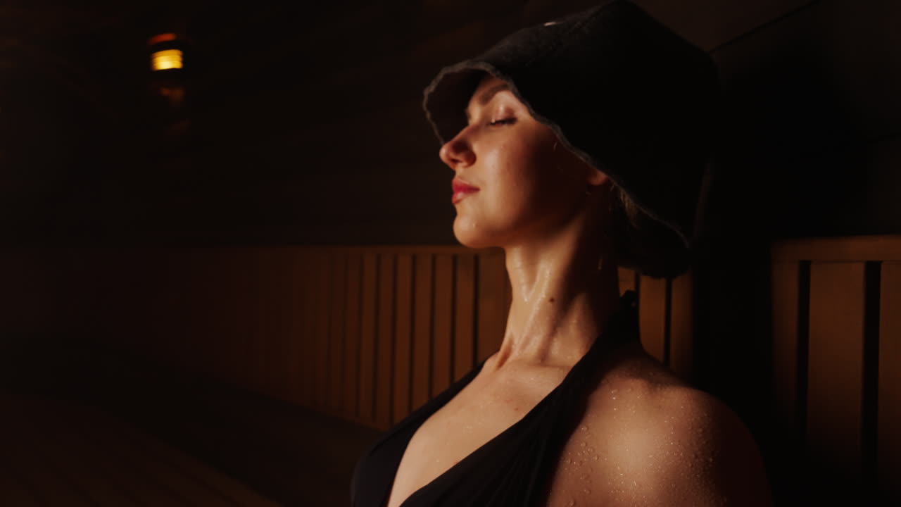Woman Relaxing in Sauna