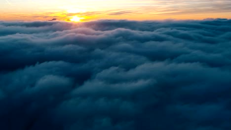 drone timelapse of moving clouds from above