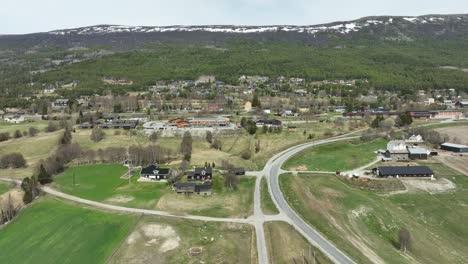Small-countryside-village-of-Lesja-in-Innlandet-Norway---Aerial