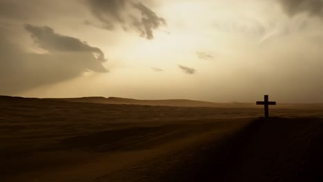 wooden cross stands on a sand dune in the desert, while clouds drift overhead, creating a serene spiritual atmosphere