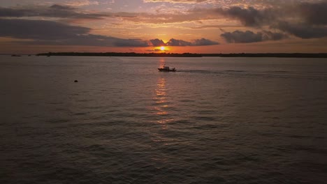aerial of sun setting at the pacific in colombia