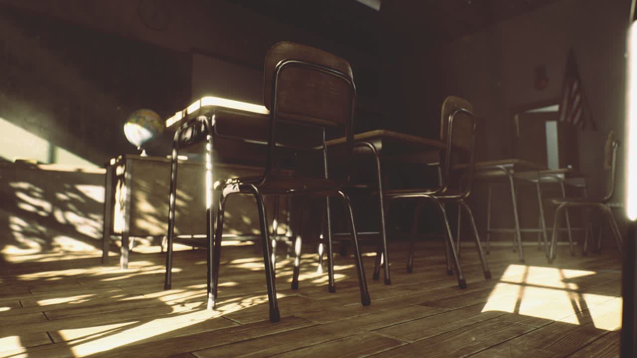 Sunlight streaming through a classroom revealing forgotten desks and chairs