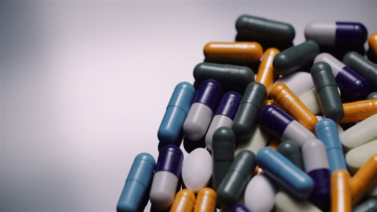 Various Medical Pills Drugs Black Background Pharmaceutical Industry Painkillers Rotating 3