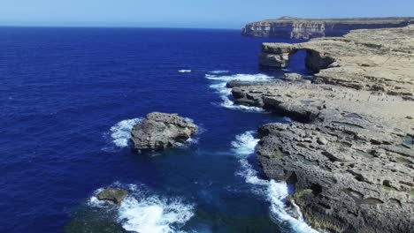 A-drone-video-of-azure-window-during-a-sunny-day