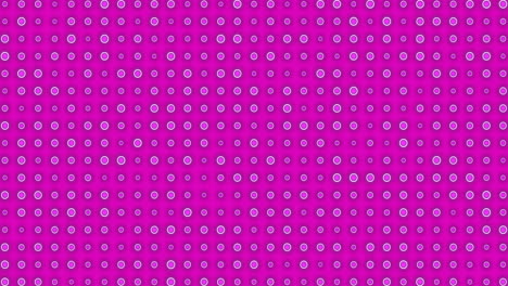 animation of rows of flickering green discs on pink background