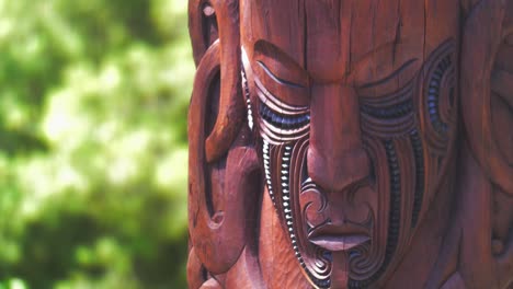 maori art traditional wooden carving of warrior's face