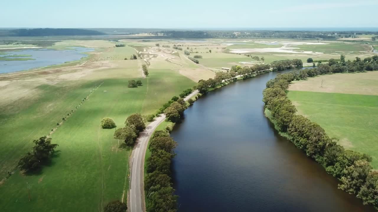 Drone flying along the Snowy River and adjacent wetlands near Marlo, in Gippsland, Victoria, Australia, December 2020