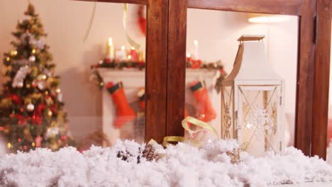 lantern decorated with fake snowfall