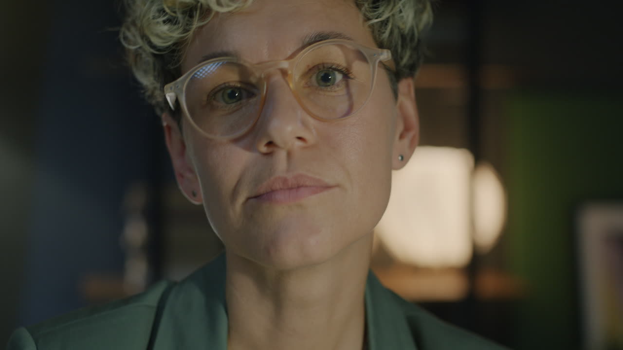 Focused Woman at Work at Night