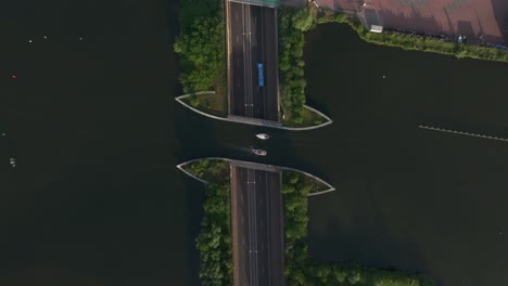 aquaduct veluwemeer harderwijk boats passing by at the veluwe lake, aerial