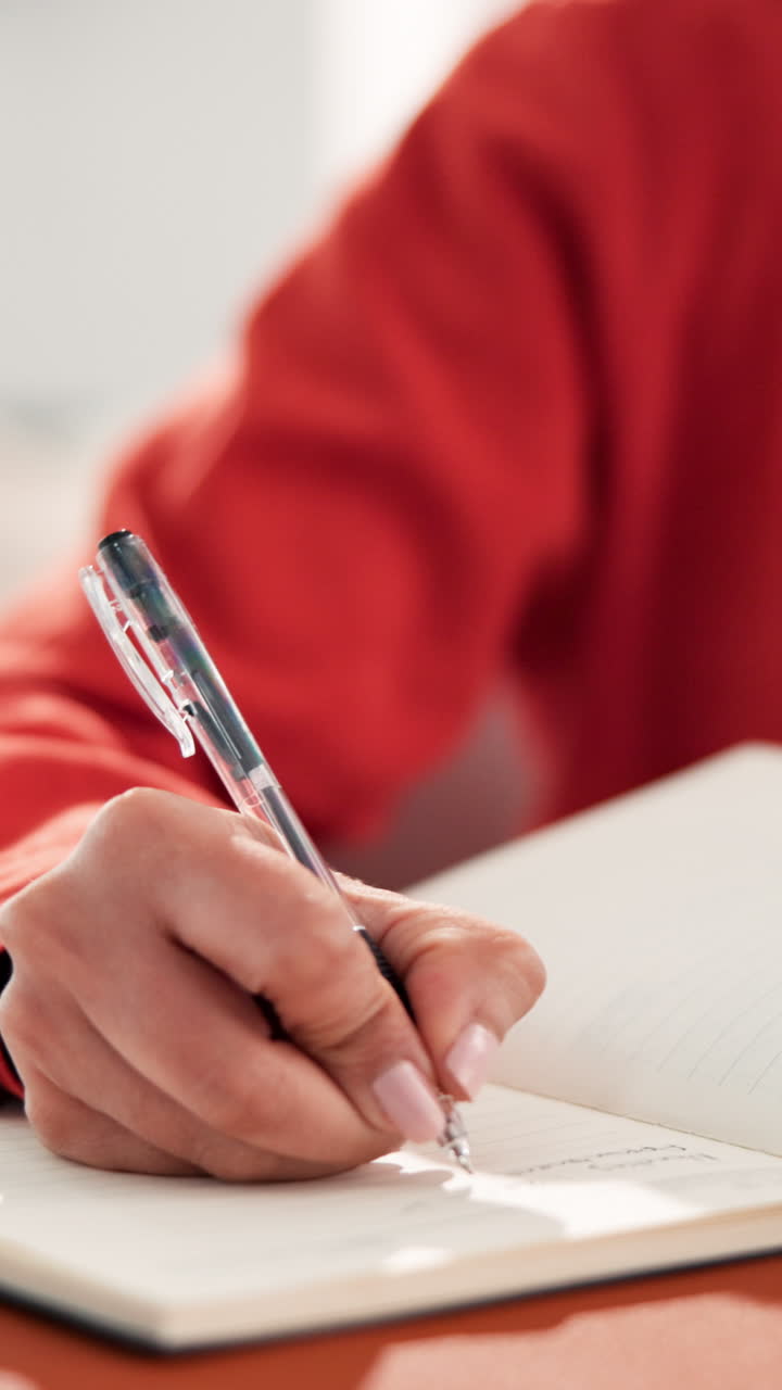 Writing in a Notebook