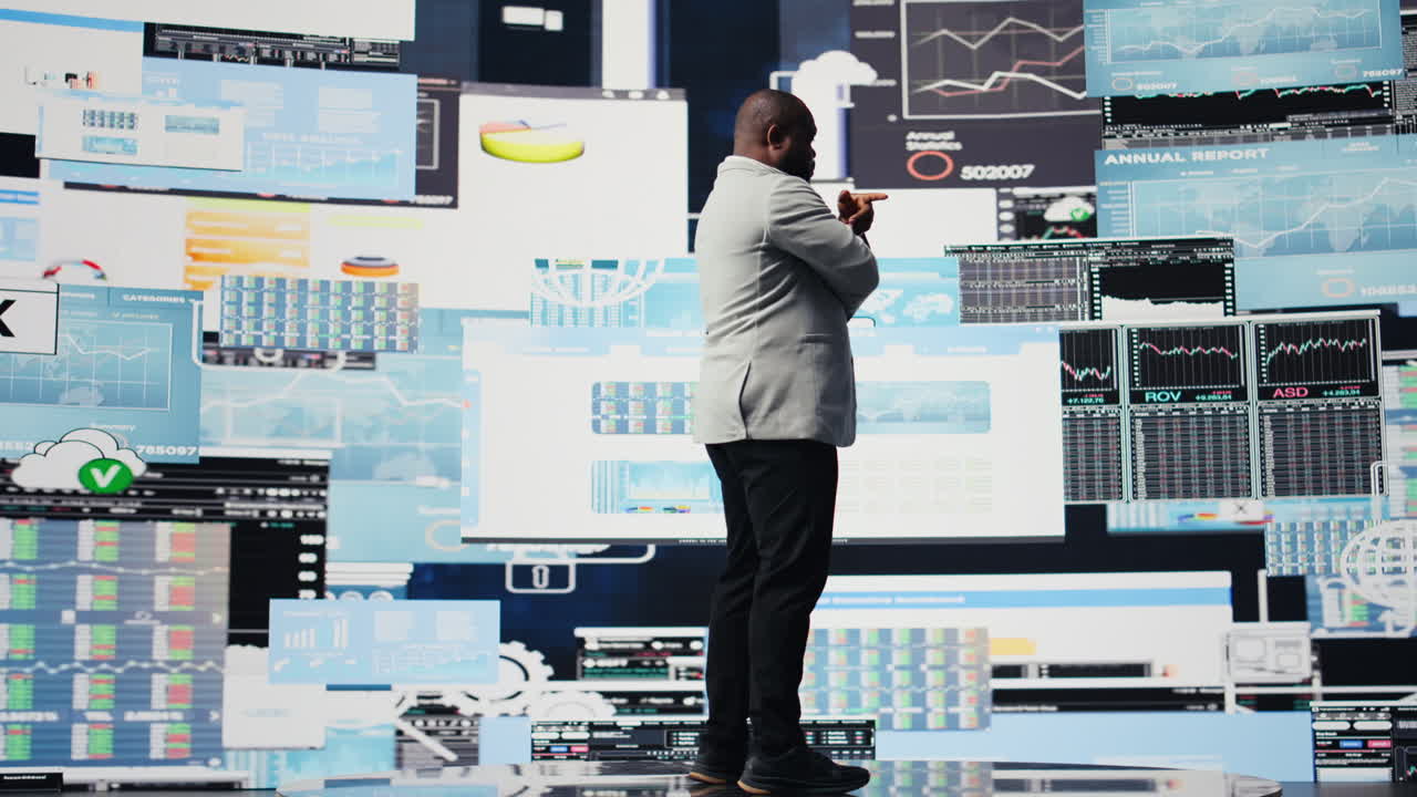 African american guy reflecting on annual financial reports for new development