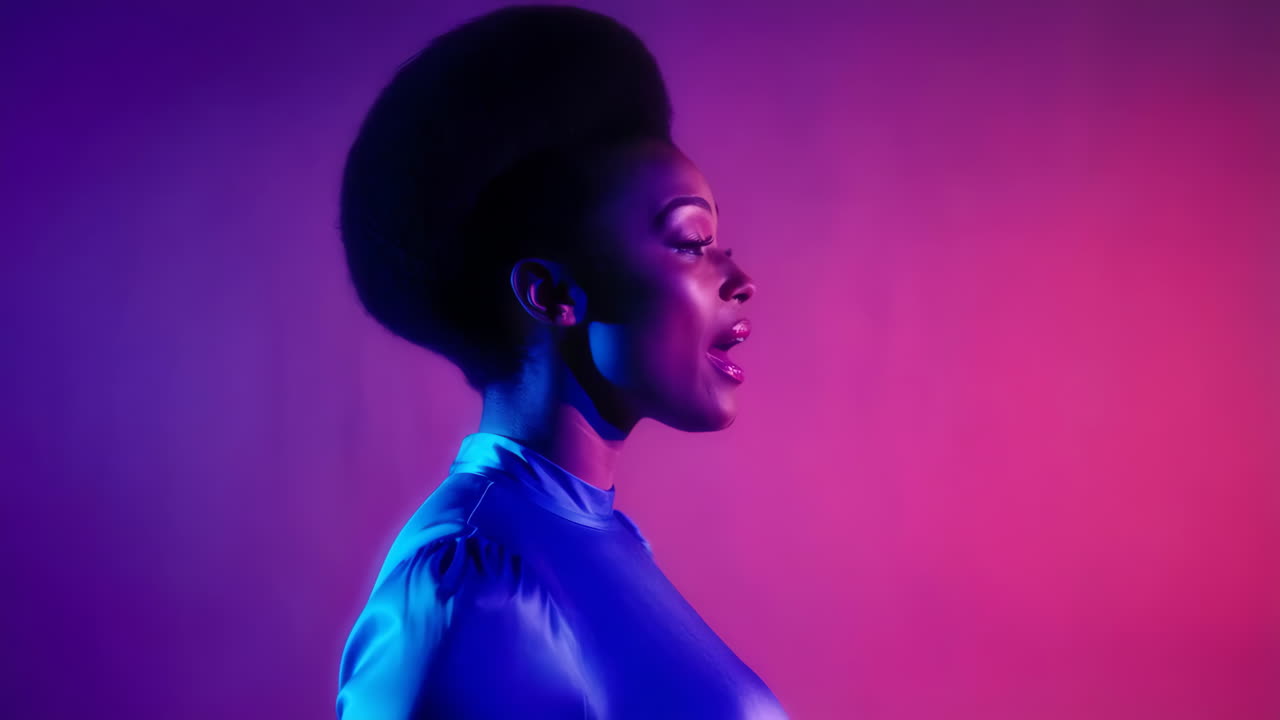 Woman's Profile in Striking Blue and Red Lighting