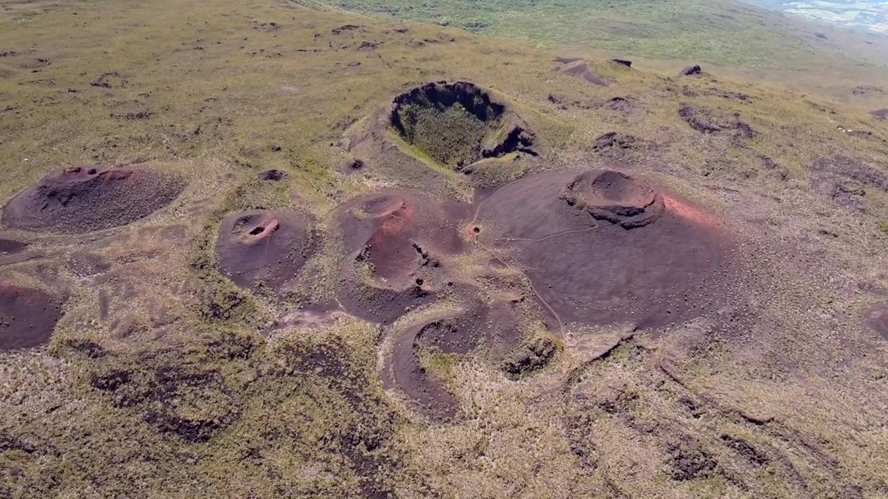 France, Réunion Island, Puys Ramond Craters. Aerial view of volcanic formations. Global approach.