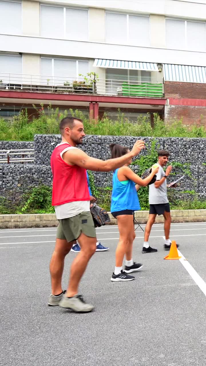 People playing baseball in a park