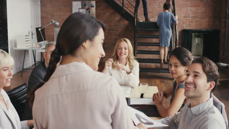 Steadicam-shot-in-of-diverse-business-team-meeting