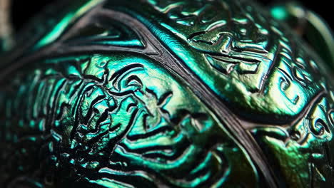 abstract iridescent metallic surface with intricate patterns