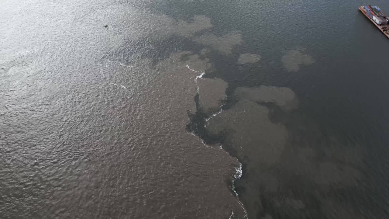 Aerial Drone Fly Above Confluence Between Tapaj&oacute;s and Amazon River, Brazilian Amazonas Water Convergence with Color Contrast
