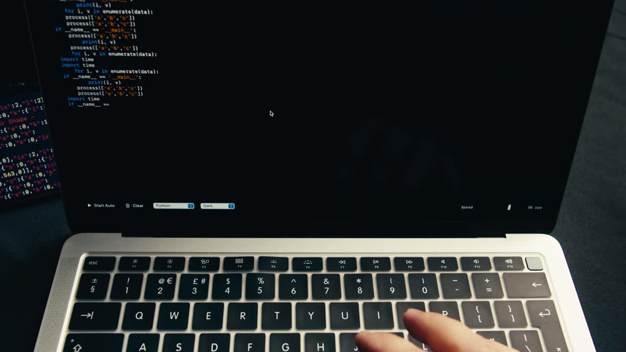 Programmer's Hands Typing Python Code on Laptop