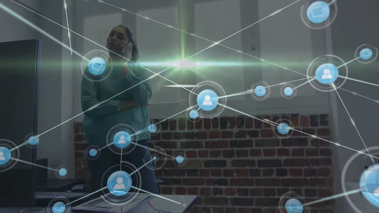 Animation of network of connections over biracial businesswoman in office