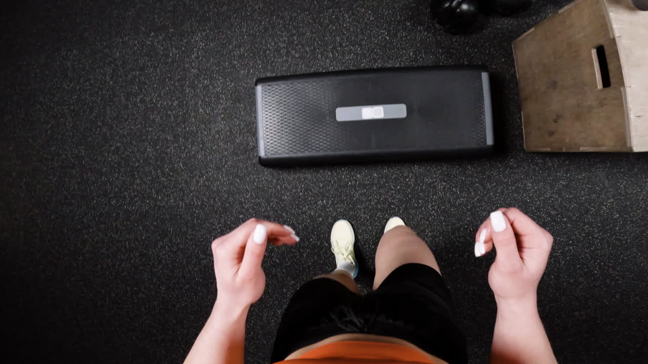 Woman Exercising with Step Platform