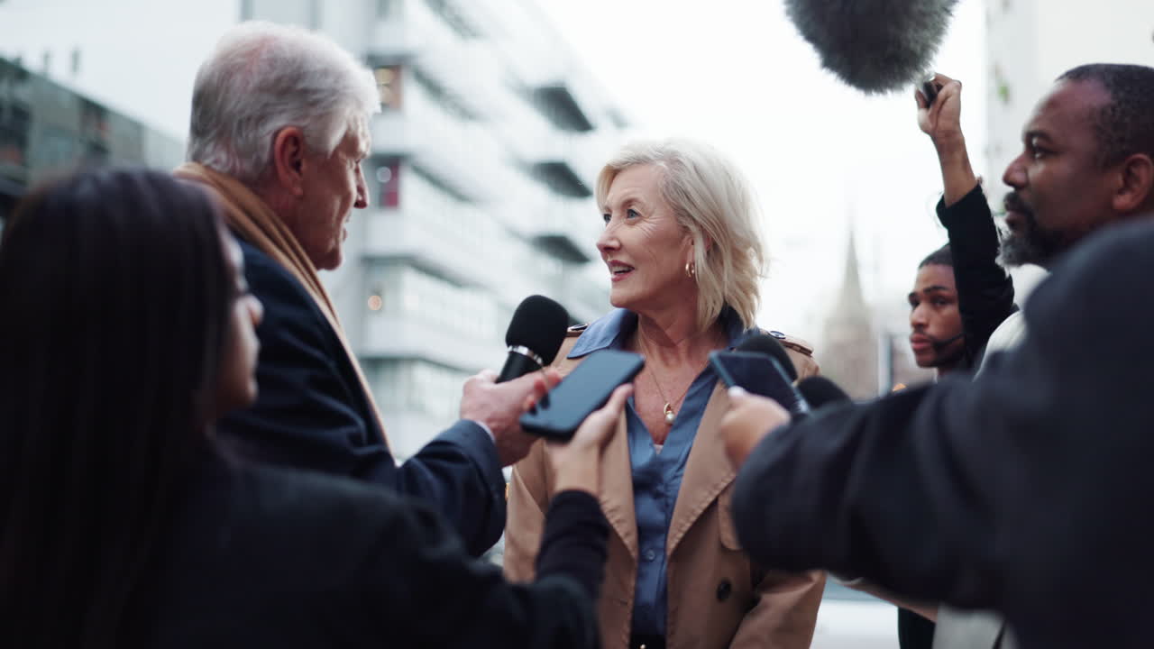 A business woman speaks to the press