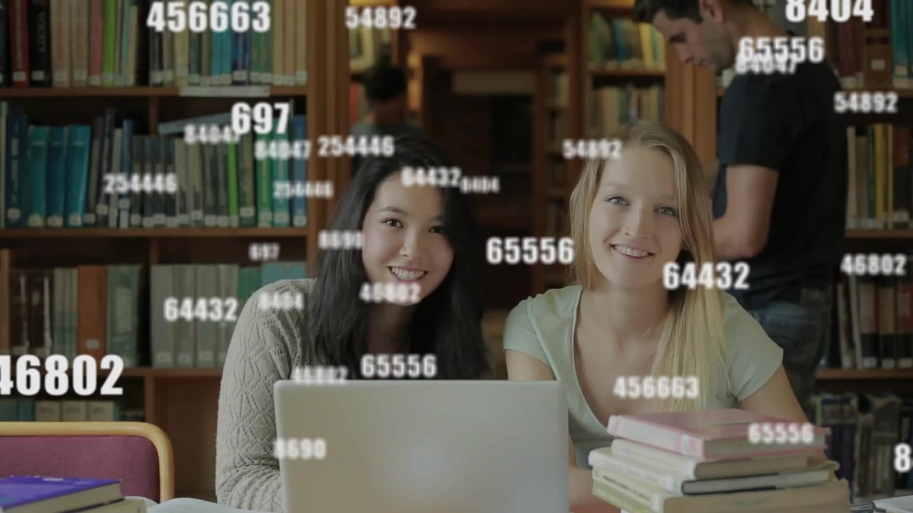 Two female students scrolling laptop in library driving streaming numbers growing then shrinking