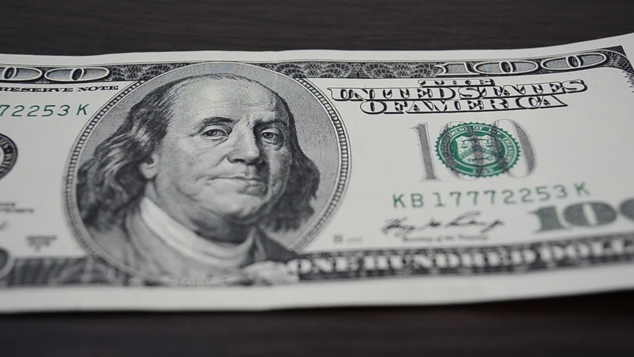 Banknote of the USA. Shooting of money