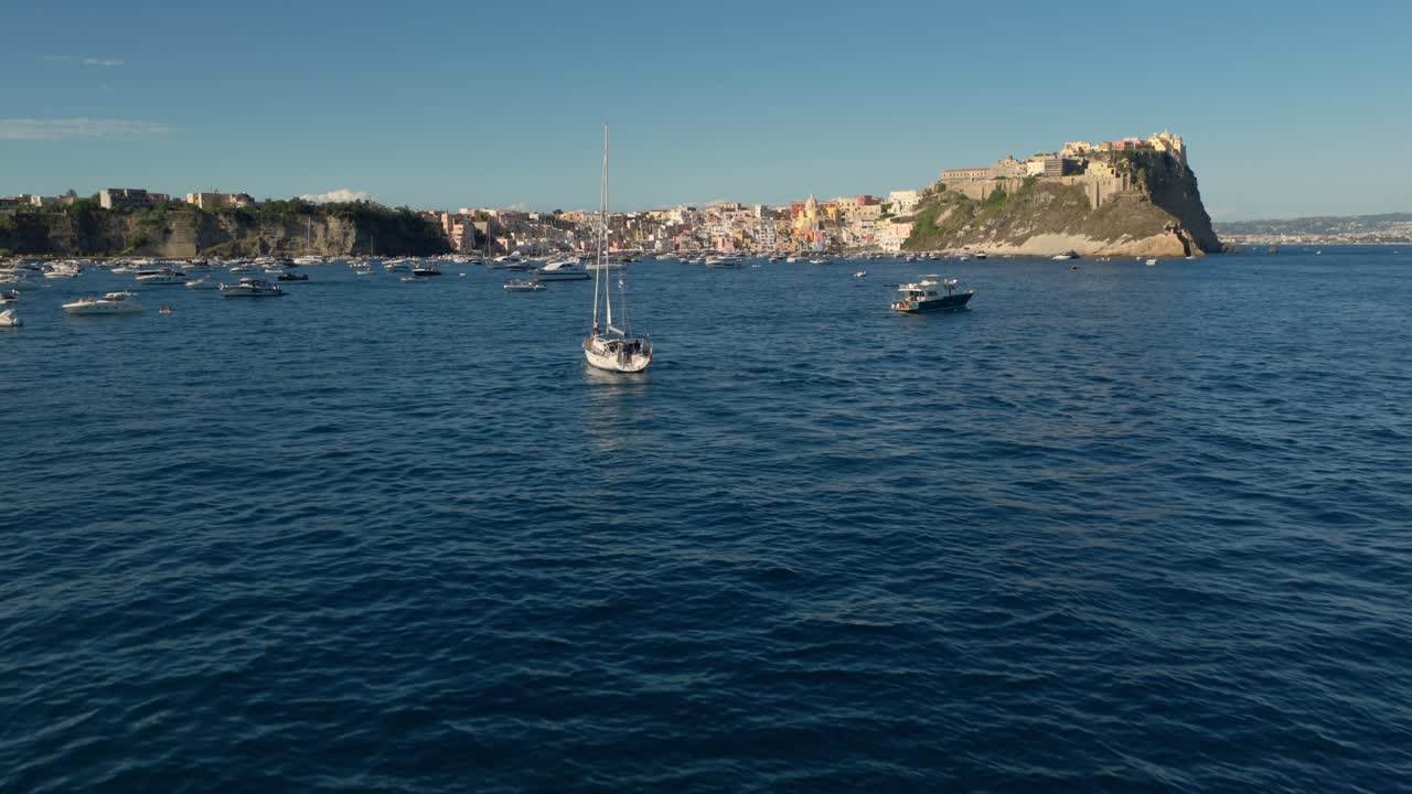 Reveals Procida Small And Authentic Volcanic Island In The Bay Of Naples, Italy. Tilt-up Shot