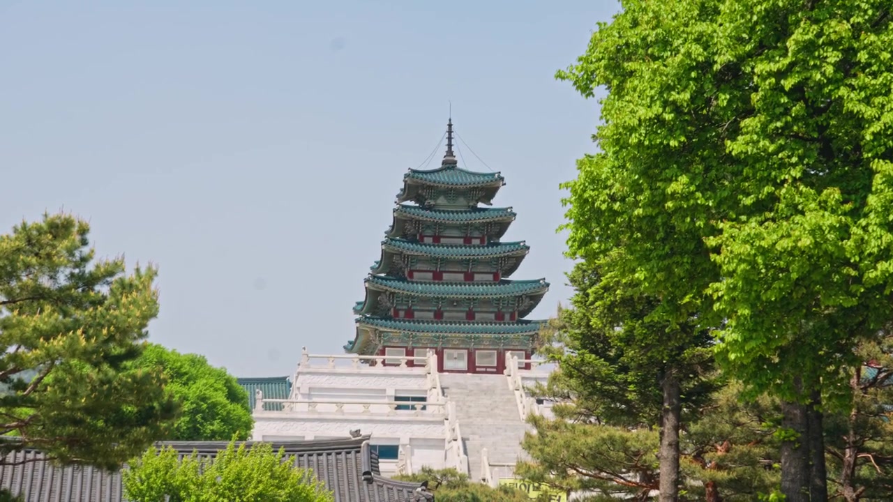 Gyeongbokgung Palace is the primary royal palace of the Joseon Dynasty, built in 1395 in central Seoul, celebrated for its monumental gates, traditional wooden architecture, and grand courtyards.