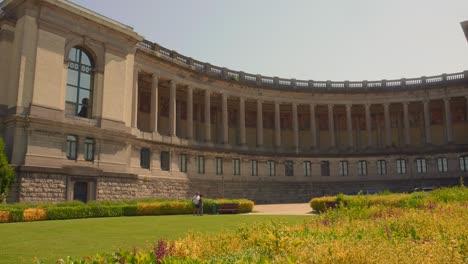 cinquantenaire park on a sunny day in brussels, belgium - panning