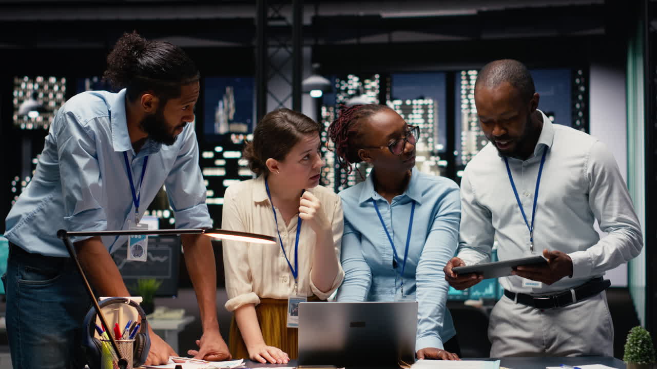 Multiethnic business team engaged in collaborative teamwork inside office