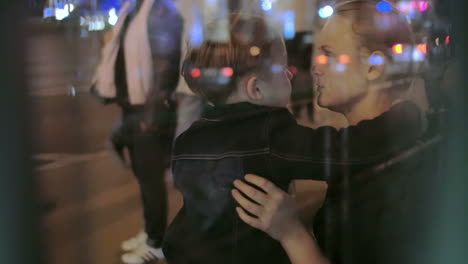 Mother-and-Son-on-a-Bus-Stop