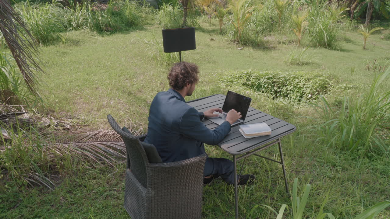 Freelancer Working On Laptop In Bali