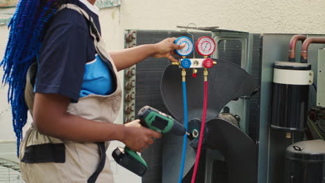 electrician working on air conditioner