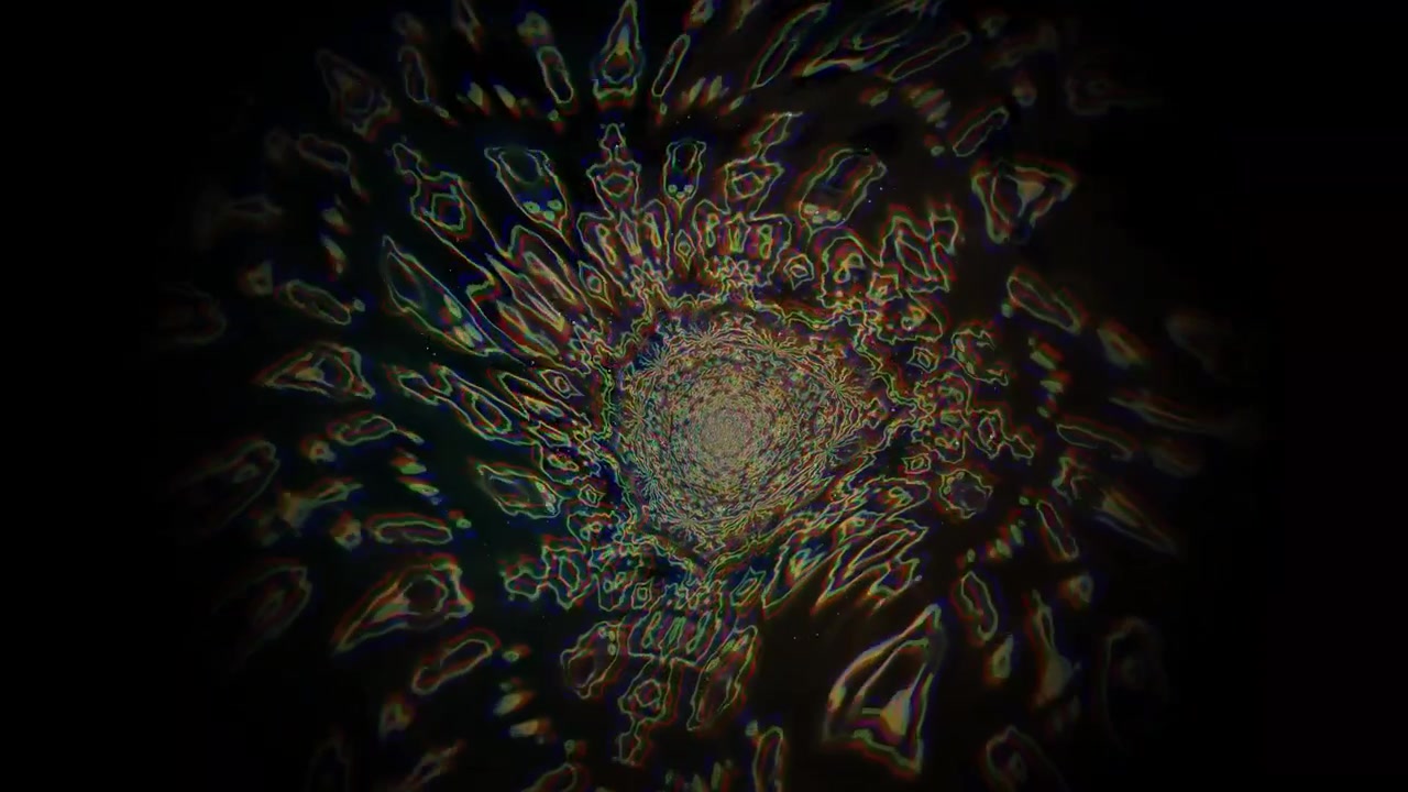 Un vortice di colori e forme crea un motivo astratto in un ambiente scuro. Il movimento genera un senso di dinamismo ed energia, catturando l'attenzione dello spettatore.