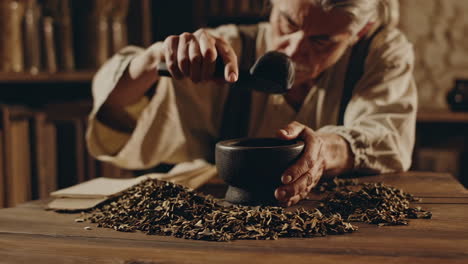 herbalist preparing traditional medicine