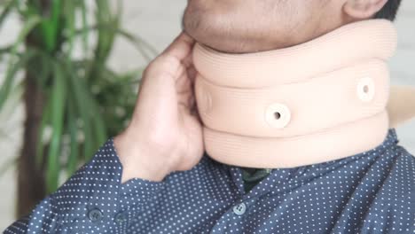 man wearing a cervical collar