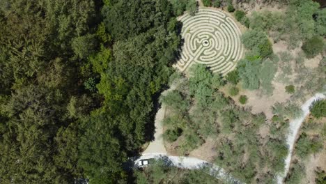 Aerial-rising-shot-showing-a-famous-stone-maze-puzzle-in-the-countryside