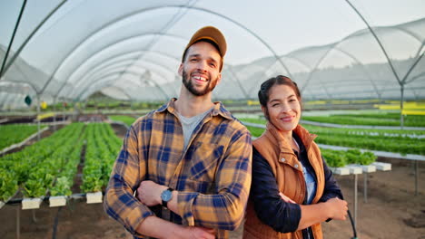 happy farmers in greenhouse