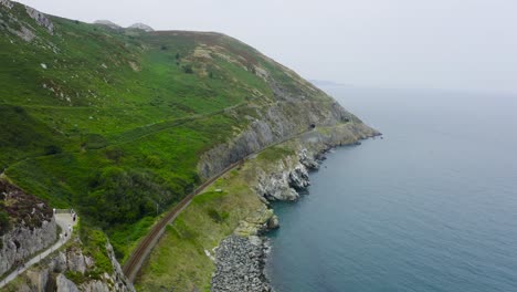 aerial view of the bray head cliffs with people walking about the trails-1